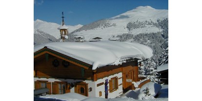Allergiker-Hotels - Terrasse - Haus mit seitlichem Eingang im Winter,
Berg: Ronachgeier - Hochkrimml 108/2