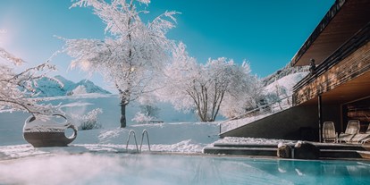 Allergiker-Hotels - barrierefrei - PLZ 6992 (Österreich) - Naturhotel Chesa Valisa Pool im Winter - Das Naturhotel Chesa Valisa****s