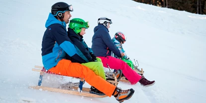 Allergiker-Hotels - Kinderbecken: Becken mit Chlor - Rodeln m Familiensciberg St. Jakob im Walde - en riesen Spaß für die ganze Familie - Familienhotel Berger ***superior