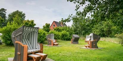Allergiker-Hotels - Sauna - Unser malerischer Wohlfühlgarten bietet viel Platz zum Verweilen. Hier entspannen Sie in unseren neuen und großen Strandkörben in ruhiger Umgebung bei einem guten Buch und lassen sich dabei von der Sonne verwöhnen. - Das Frühstückshotel SPO
