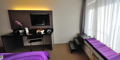 Allergiker-Hotels - rauchfreies Hotel - "Wehrgang" Zimmer mit Original Ehinger Stadtmauer - Best Western Plus BierKulturHotel Schwanen