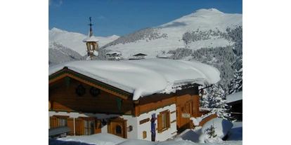 Allergiker-Hotels - rauchfreies Hotel - Haus mit seitlichem Eingang im Winter,
Berg: Ronachgeier - Hochkrimml 108/2