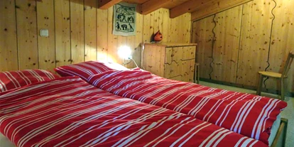 Allergiker-Hotels - rauchfreies Hotel - Schlafzimmer 2 mit Kleiderschrank und Kommode - Hochkrimml 108/2