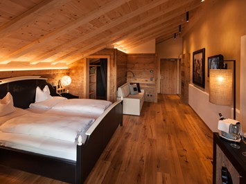 Tirler Dolomites Living Hotel  Zimmerkategorien Alpine Living - 100% Luis Trenker 