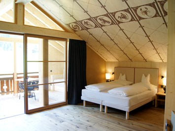 Tirler Dolomites Living Hotel  Zimmerkategorien Chalet 1752