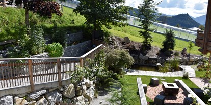 Allergiker-Hotels - Salzburg - Zen Garten mit Fischteich, Kräuter Garten und Blumen  - Gesund und Vital Landhotel Anna